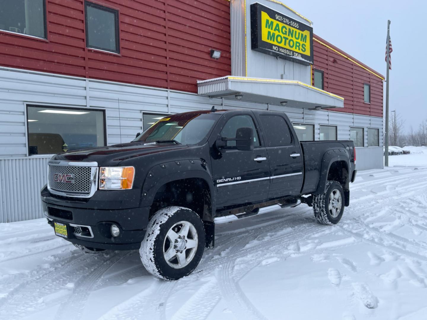 2014 Black /black leather GMC Sierra 2500HD Denali Crew Cab 4WD (1GT125EGXEF) with an 6.0L V8 OHV 16V FFV engine, 6-Speed Automatic transmission, located at 1960 Industrial Drive, Wasilla, 99654, (907) 274-2277, 61.573475, -149.400146 - Photo#0